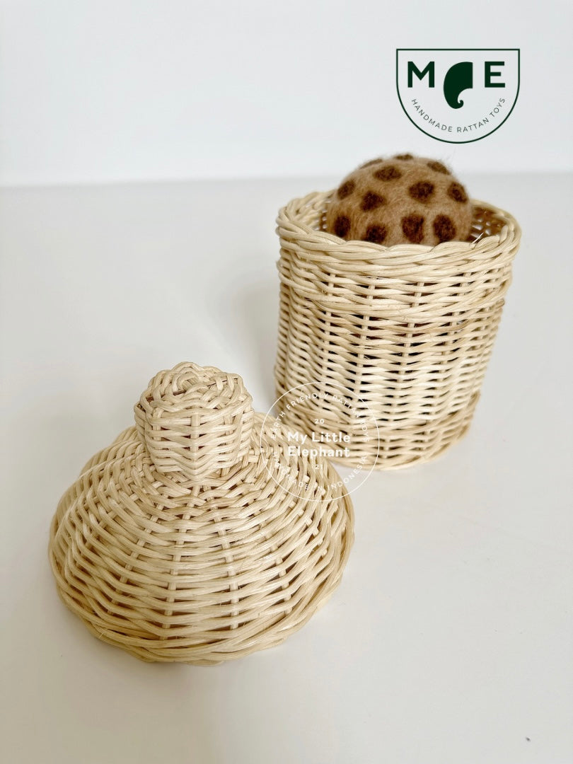 rattan cookie jar with open lid and felt cookies